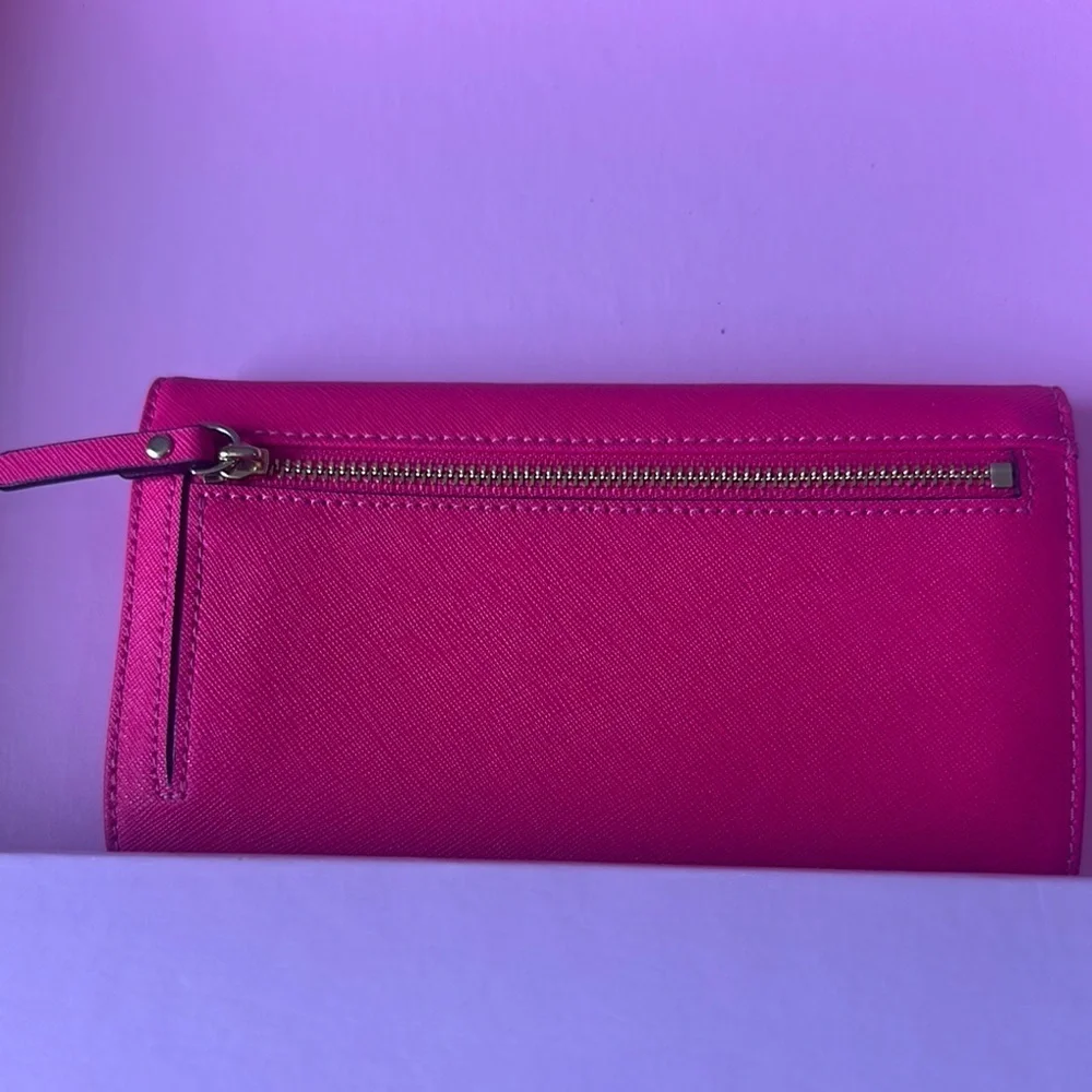 Kate Spade Pink Wallet Sleek Fold-Over Design (Inside plastic is stained)